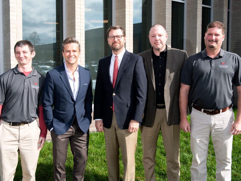 property-management-team-including-todd-outside-new-office property-management-team-including-todd-outside-new-office
